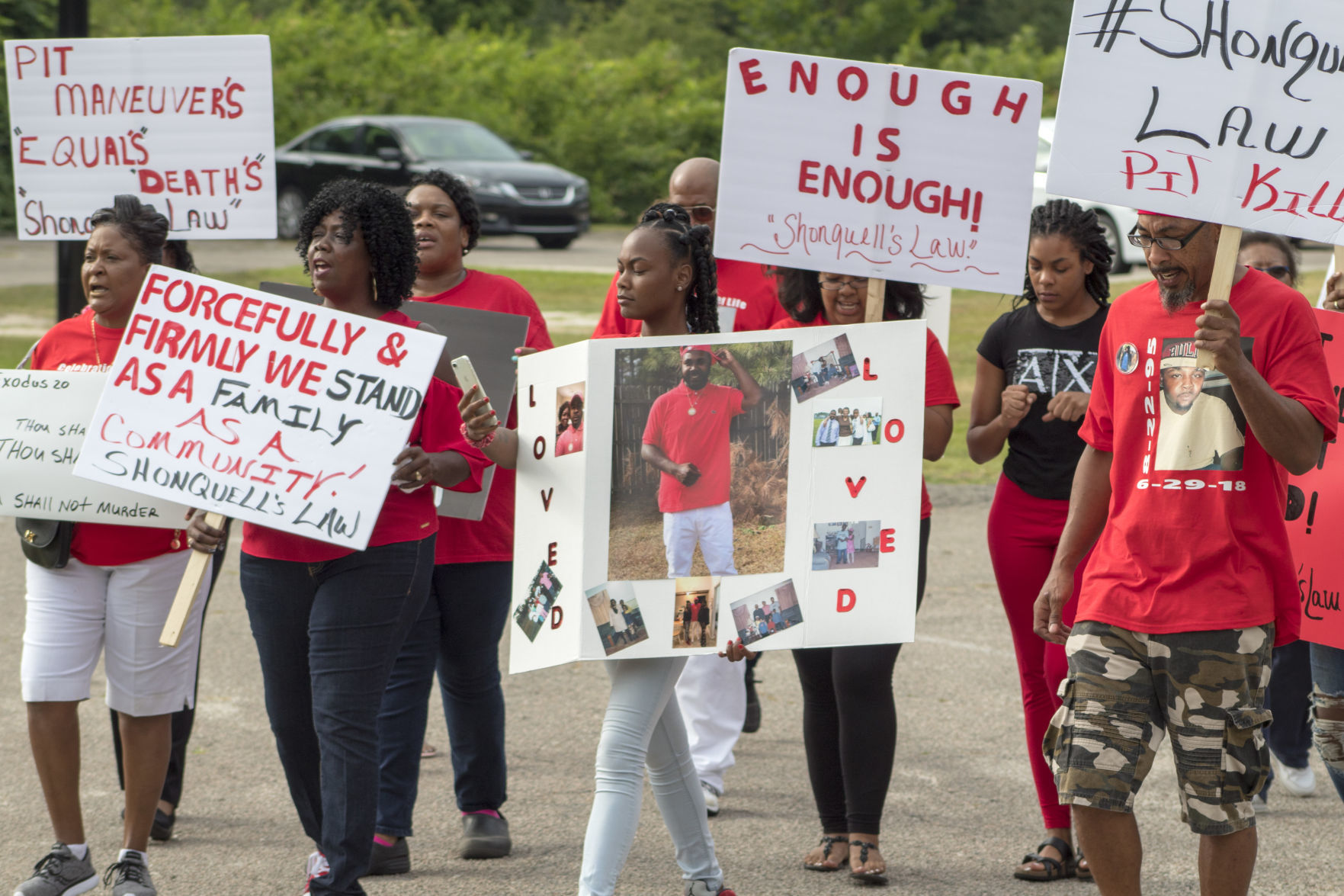 Protesters call for the banning of PIT maneuvers